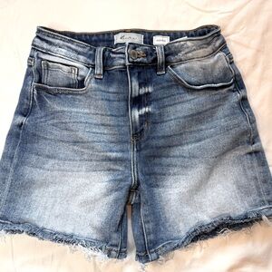 KanCan size 26 Women’s denim high rise cutoffs in excellent condition.